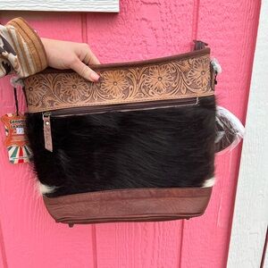 Ohlay brand (American darling partners) hair on hide cross body. Very beautiful